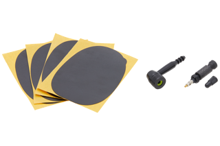 Im Lieferumfang ist Tubeless-Ventil, Pumpenadapter und ein Ventilabdeck-Stickerset enthalten.